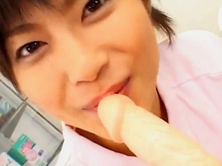 Japanese nurse fucks big cock after practicing with XXX toy in Tokyo.